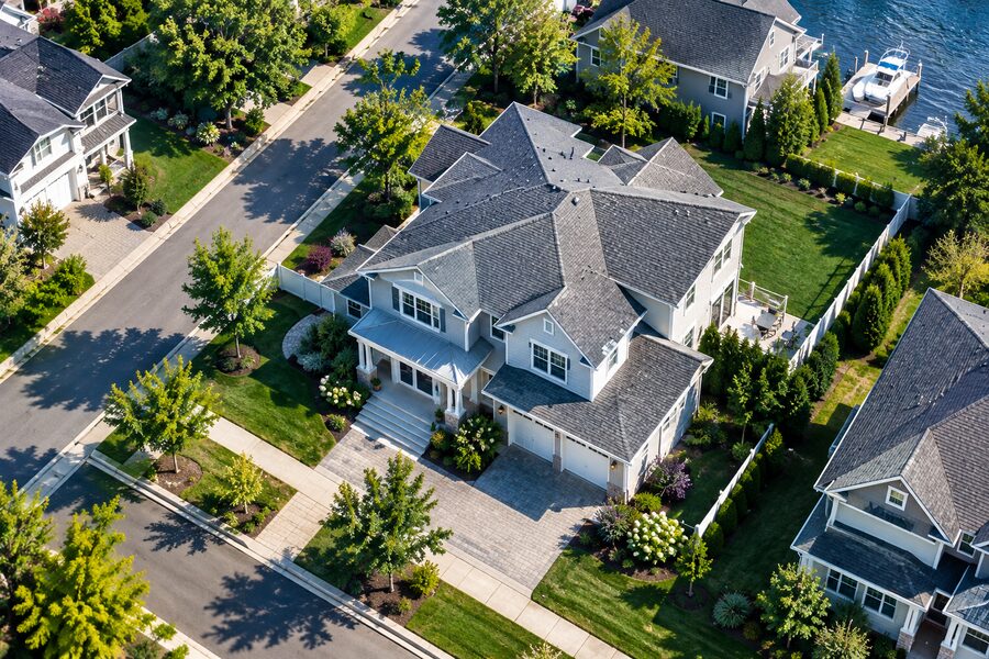 Aerial view of a house and its surrounding property