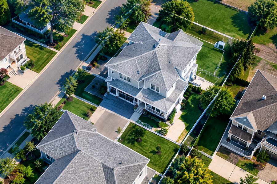 Aerial view of a single suburban home and its lot