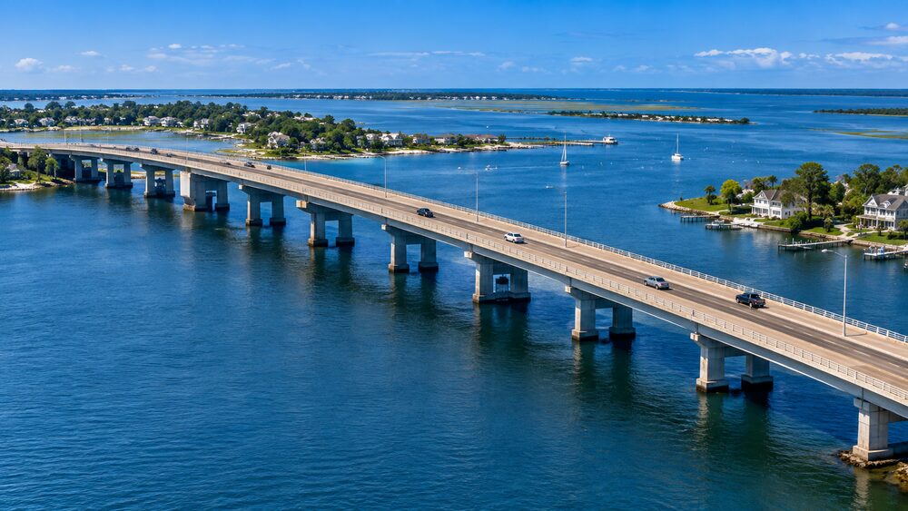A causeway bridge crossing a coastal bay